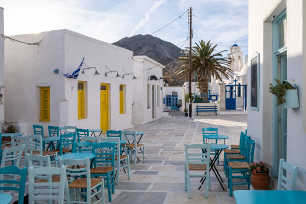 istock Serifos island, Chora, Cyclades Greece. Open empty cafe tavern chairs tables background. 1330205721