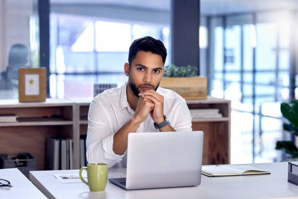 istock Shot of a young businessman at work 1330206112