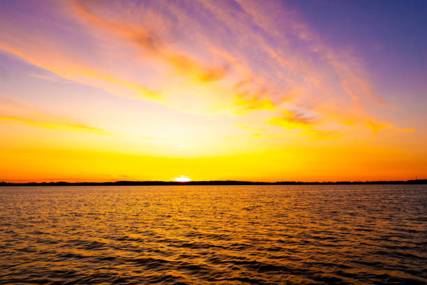 istock Bright beautiful sunrise or sunset at sea. 1330210930