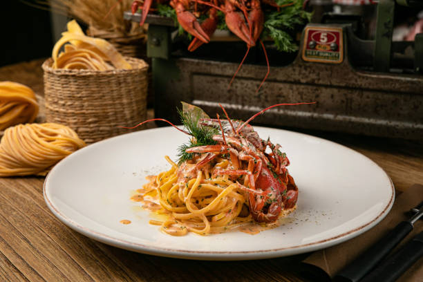 istock Italian pasta with boiled crayfish and sauce 1330211304