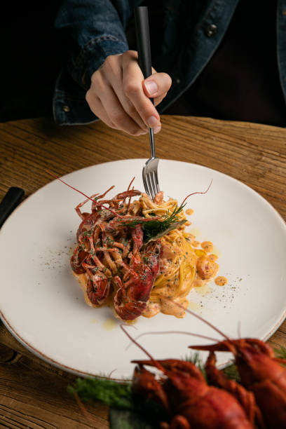 istock Italian pasta with boiled crayfish and sauce 1330211325