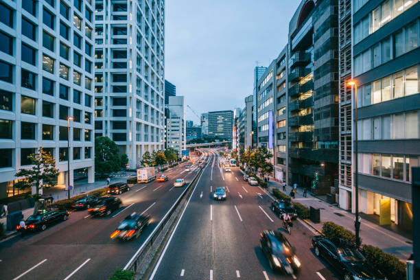 istock Vehicles driving through Tokyo streets in motion 1330218311