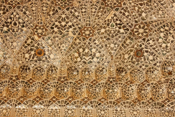 Jaipur, Rajasthan, India - February 2012: Close up detail of the beautiful mirror work at the ancient Sheesh Mahal palace in the Amer Fort in the city of Jaipur in Rajasthan, India.