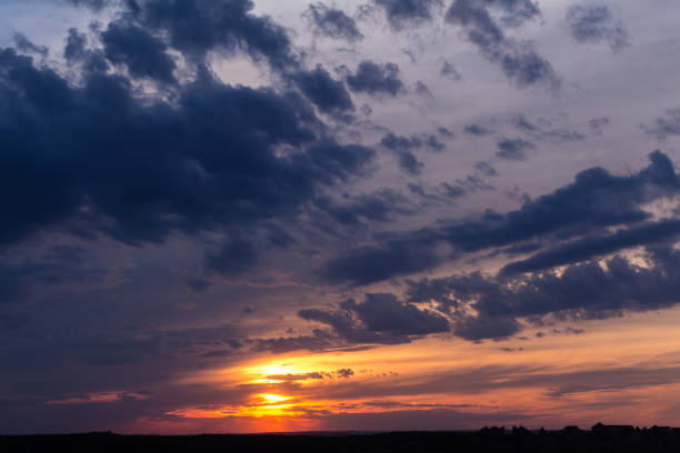 istock Colorful sunset with clouds in the evening 1330219986