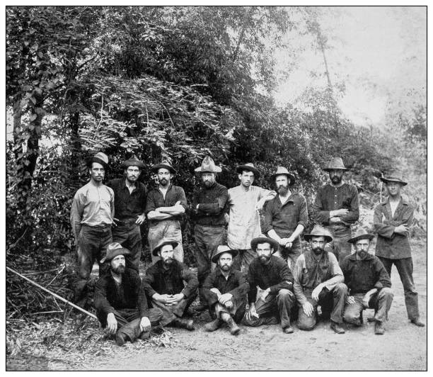 Antique black and white photograph: American soldiers, Luzon, Philippines Antique black and white photograph of people from islands in the Caribbean and in the Pacific Ocean; Cuba, Hawaii, Philippines and others: American soldiers, Luzon, Philippines filipino ethnicity stock illustrations