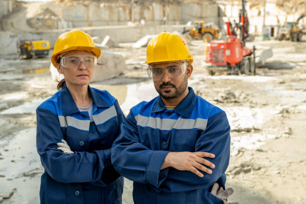 istock Two mature professional builders crossing arms by chest 1330222775