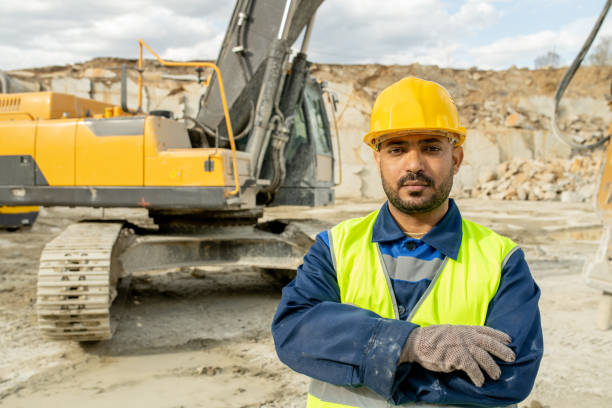 istock Serious builder in workwear crossing arms on chest 1330222816