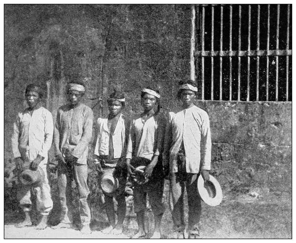 istock Antique black and white photograph: Filipino prisoners 1330227579