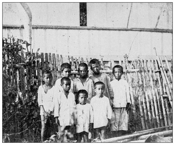 istock Antique black and white photograph: Filipino boys 1330227603