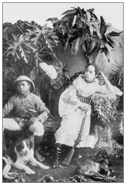 istock Antique black and white photograph: Boy and Girl, Philippines 1330227975