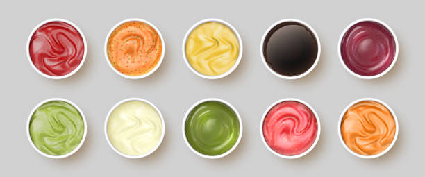 ilustrações de stock, clip art, desenhos animados e ícones de dip sauces top view. bowls with mayonnaise, tomato ketchup, mustard, pesto, curry and guacamole. realistic spicy seasoning sauce vector set - sauces dip ketchup mayonnaise