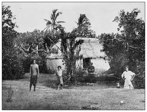 Antique black and white photograph of people from islands in the Caribbean and in the Pacific Ocean; Cuba, Hawaii, Philippines and others: Samoan family