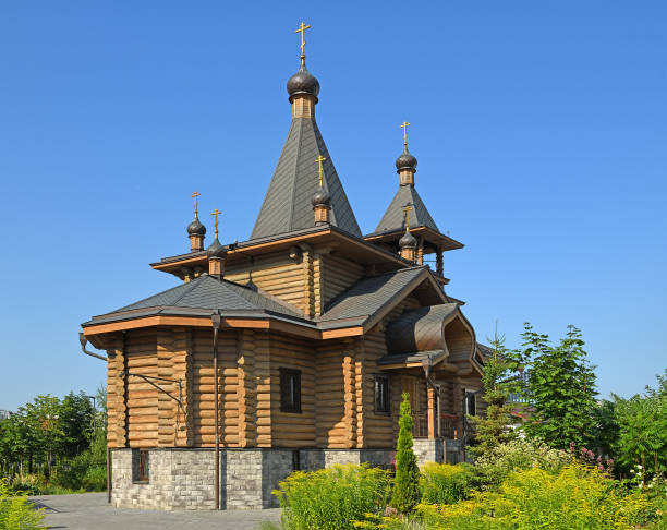 chapel in honor of archangel gabriel on khodynka field in blooming garden. moscow, russia - sao gabriel tower imagens e fotografias de stock