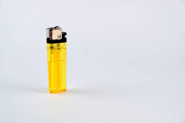 istock Yellow lighter isolated on white background stock photo 1330230139