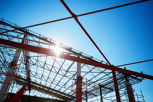 Abstract girders, beams and columns on a construction site.