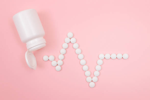 istock Heartbeat Rhythm. ECG Line Made from White Pills. Pharmaceutical Industry 1330231482