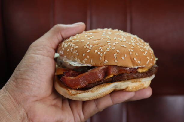 bacon hamberger on hands