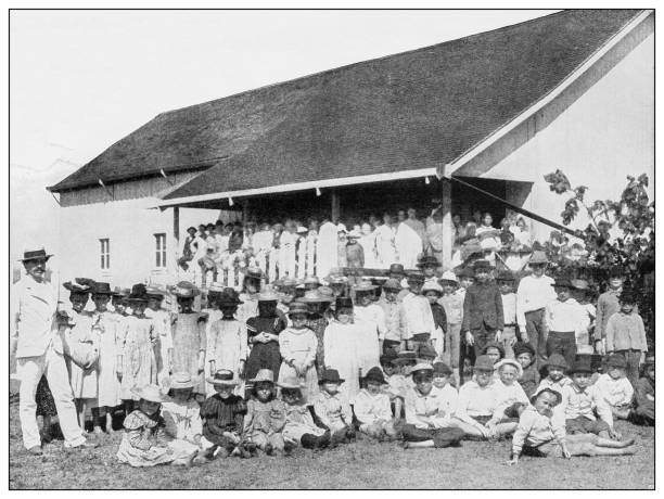 Antique black and white photograph: German School, Island of Kauai, Hawaii Antique black and white photograph of people from islands in the Caribbean and in the Pacific Ocean; Cuba, Hawaii, Philippines and others: German School, Island of Kauai, Hawaii german language photos stock illustrations