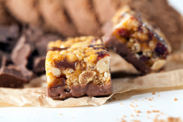 istock nuts, air rice, chocolate and other ingredients in a chocolate bar 1330237150