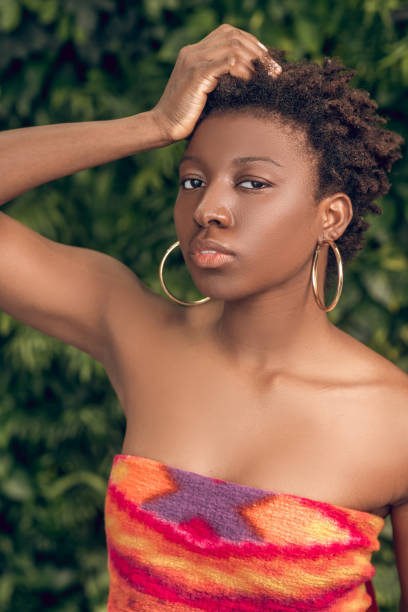 istock Slim dark skinned woman in spa salon 1330238050