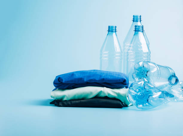 istock Polyester fiber synthetic fabrics eco-friendly textile recycled recyclable plastic bottles. Reuse recycling used bottles 1330243883