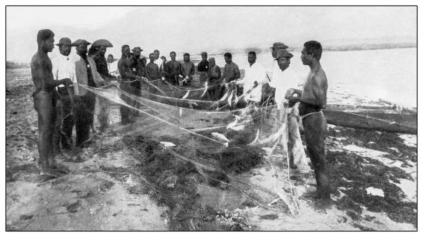 istock Antique black and white photograph: Fishermen, Hawaii 1330244578