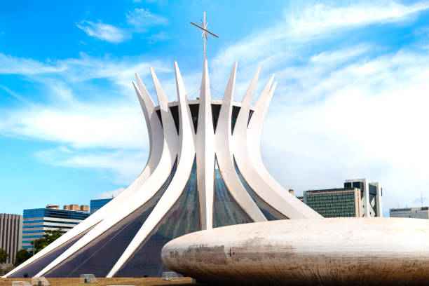 Brasilia's Cathedral (  The Metropolitan Cathedral of Nossa Senhora Aparecida ) Seen from afar. Project by architect Oscar Niemeyer. Brasilia, Federal Distritct - Brazil. July, 23, 2021.