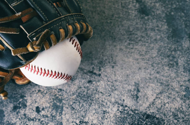 istock Baseball equipment with copy space on grunge background. 1330245126