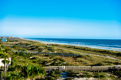 Activity and scenic shots of the beach at Kiawah Island, SC.  Yoga, strolling, horseback riding are all activities that tourists and residents partake in while at Kiawah.  Kiawah is a barrier island on the east coast of the US about 25 miles southwest of Charleston, South Carolina.