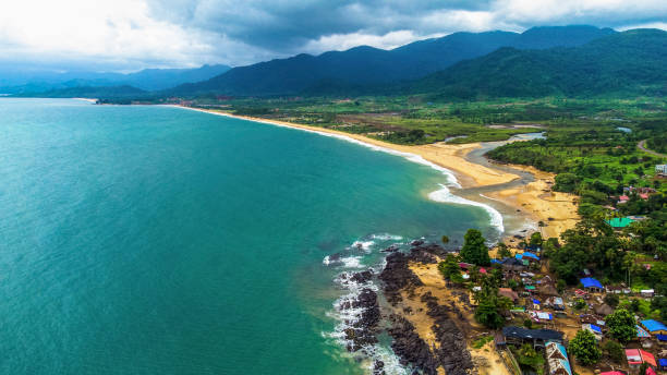 Aerial shot Aerial shot of a vilage by Atlantic ocean sierra-leone stock pictures, royalty-free photos & images