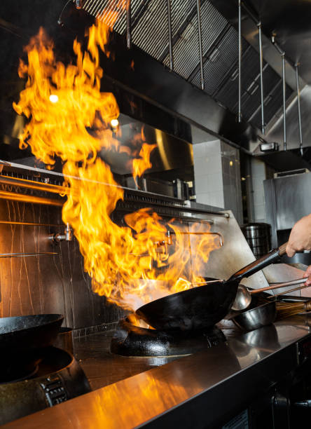 istock Cooking in the Chinese wok on fire 1330256461