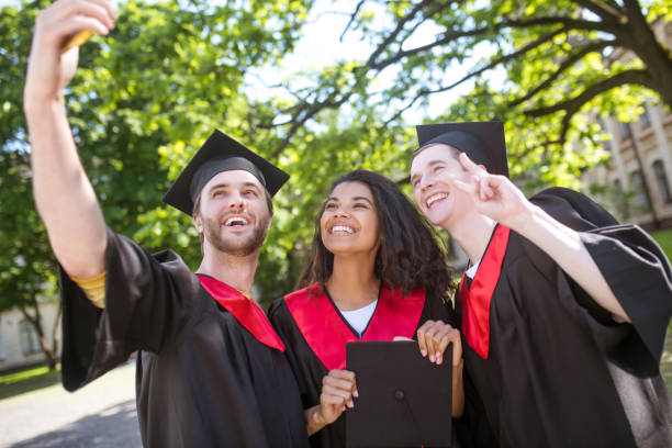 istock A group of graduates spending time together and feeling united 1330256797