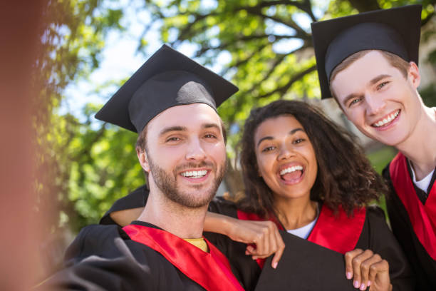 istock A group of graduates spending time together and feeling united 1330256802