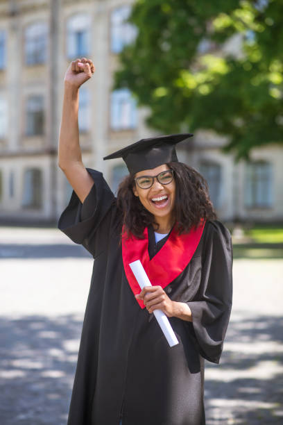 istock A female student feeling awesome about college graduation 1330256998