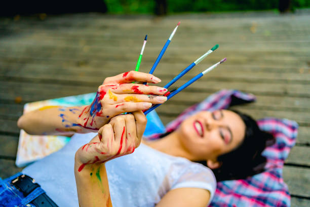 istock Woman artist with her brushes 1330258055