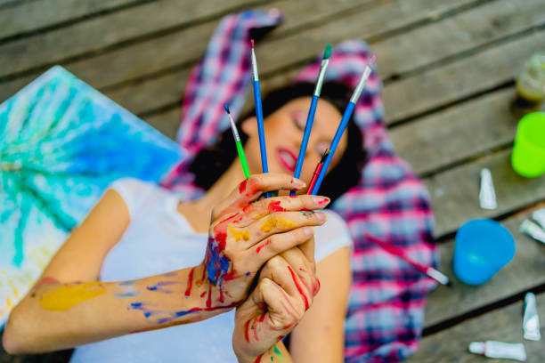 istock Woman artist with her brushes 1330258064