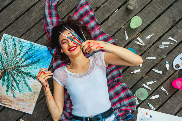 istock Woman artist with her brushes 1330258977
