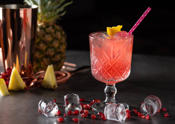 istock refreshing and light pomegranate and pineapple summer cocktail with ice cubes 1330260097