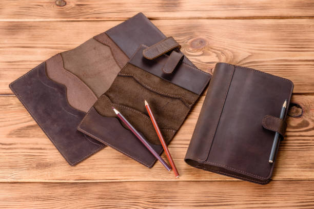 istock Beautiful leather brown case made of leather designed for a notebook 1330260208