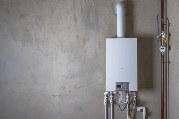 double-circuit gas boiler in a new house for winter heating and water heating - boiler stockfoto's en -beelden