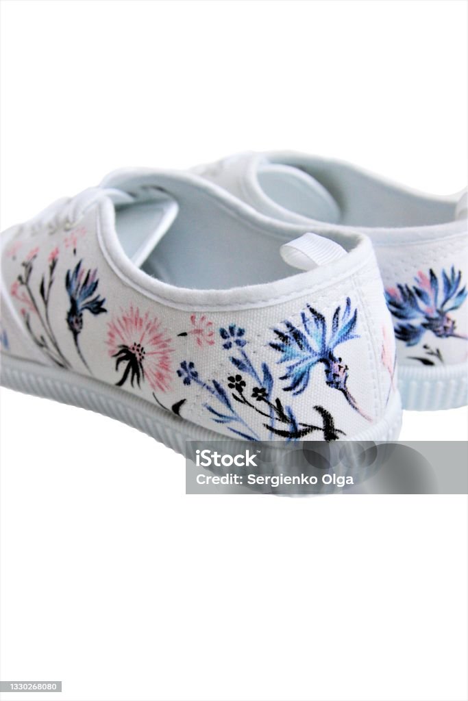 white sneakers with hand-painted wild flowers rear view Rear View Stock Photo