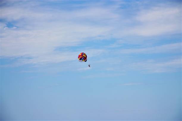 istock flying on a bright multicolored balloon 1330268093