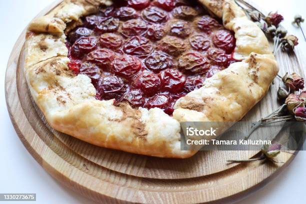 Biscuit With Plum And Cinnamon Stock Photo - Download Image Now - Prune - Fruit, Baked Pastry Item, Crostata