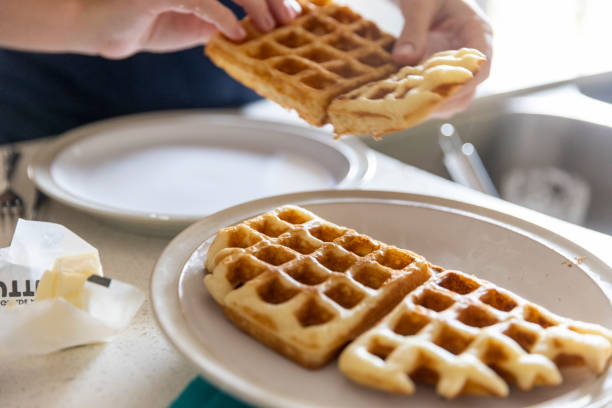 istock Young family making a gourmet waffle dinner 1330273741