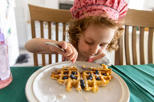 istock Young family making a gourmet waffle dinner 1330273754