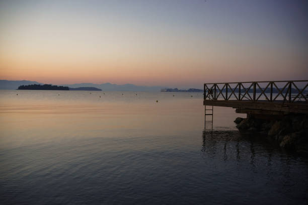 istock sunrise on the beach by the sea 1330278184