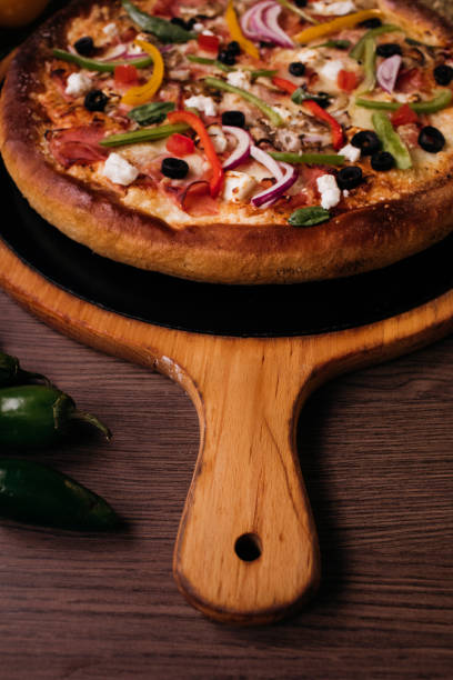 istock The cheesy goodness of a pizza 1330290343
