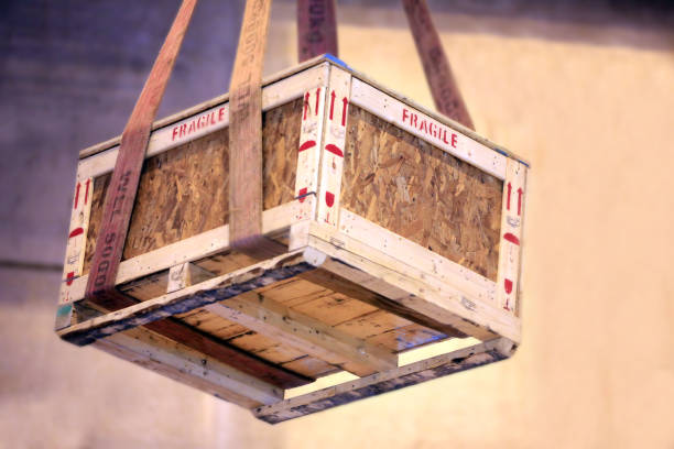 Box container screen of Fragile sign on wooden crate.