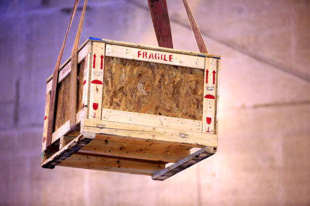 istock Box container screen of Fragile sign on wooden crate. 1330293603