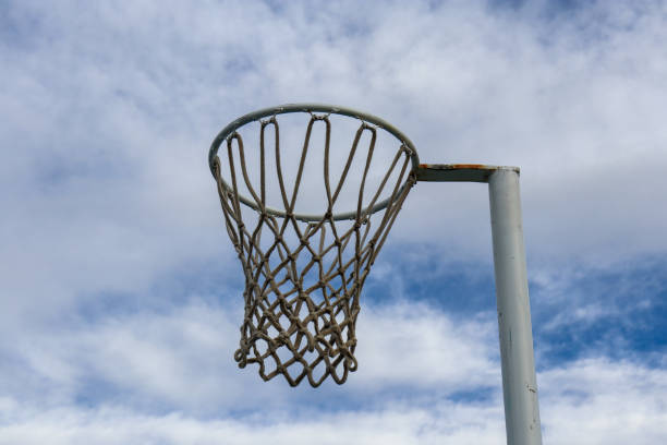 istock netball hoop against blue sky 1330299393